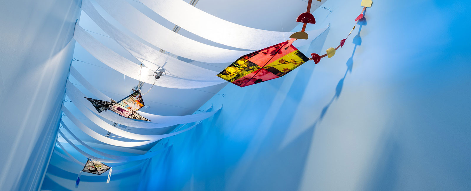 Three kites in white material