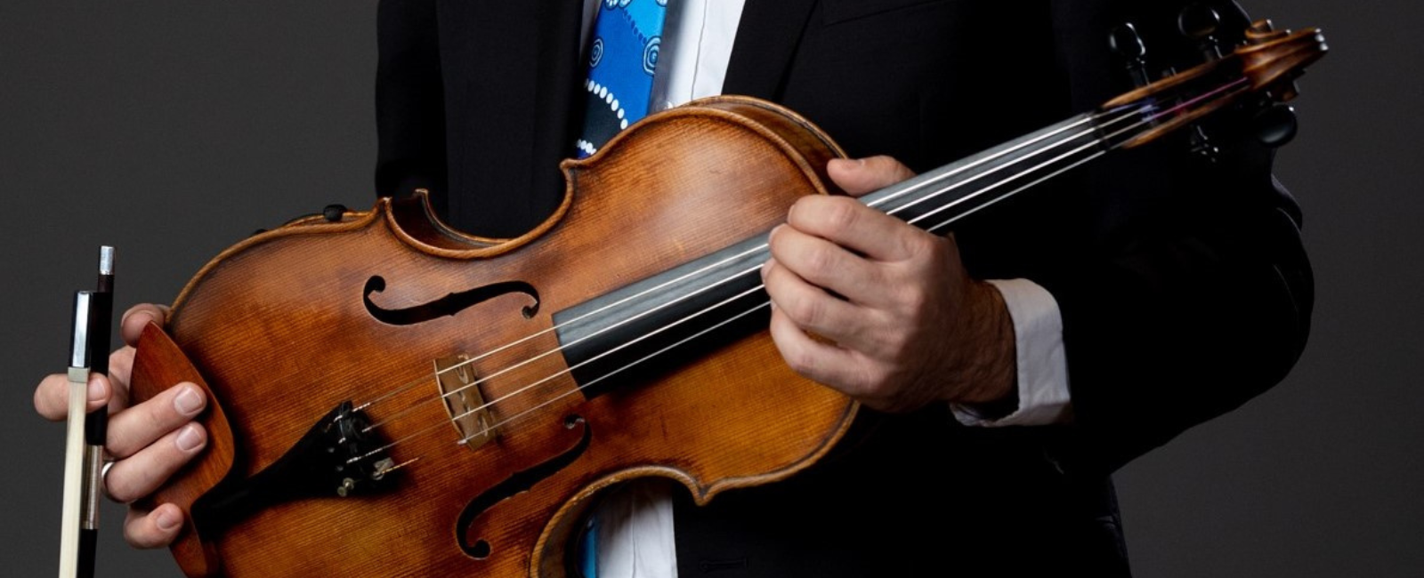 Person holding a viola